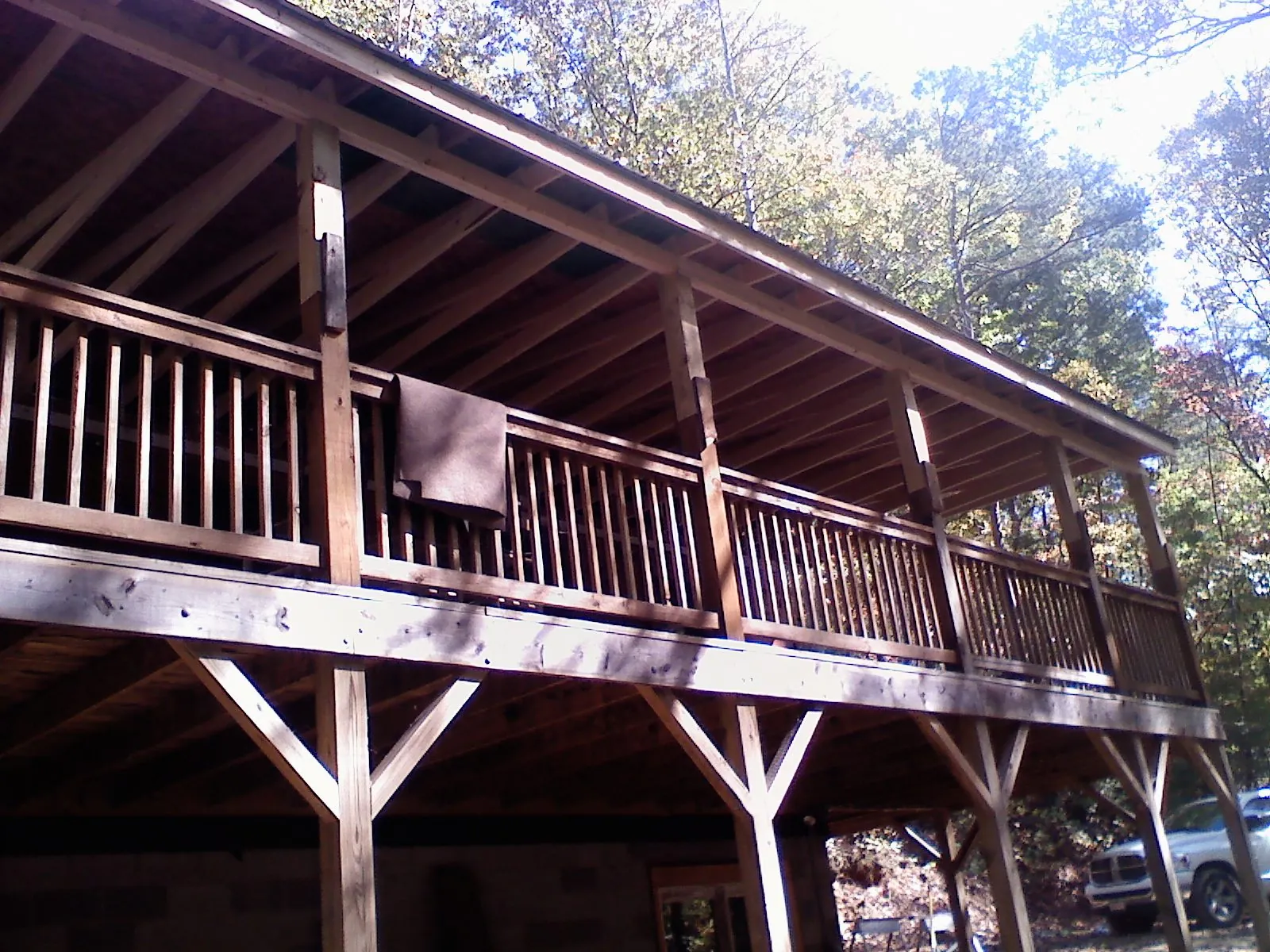 Timber framing under a new elevated porch and deck — Roof Leak Repair in Parma by Roofing Brothers